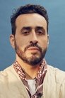 Jonathan Cohen isRoland Perez (Adult)